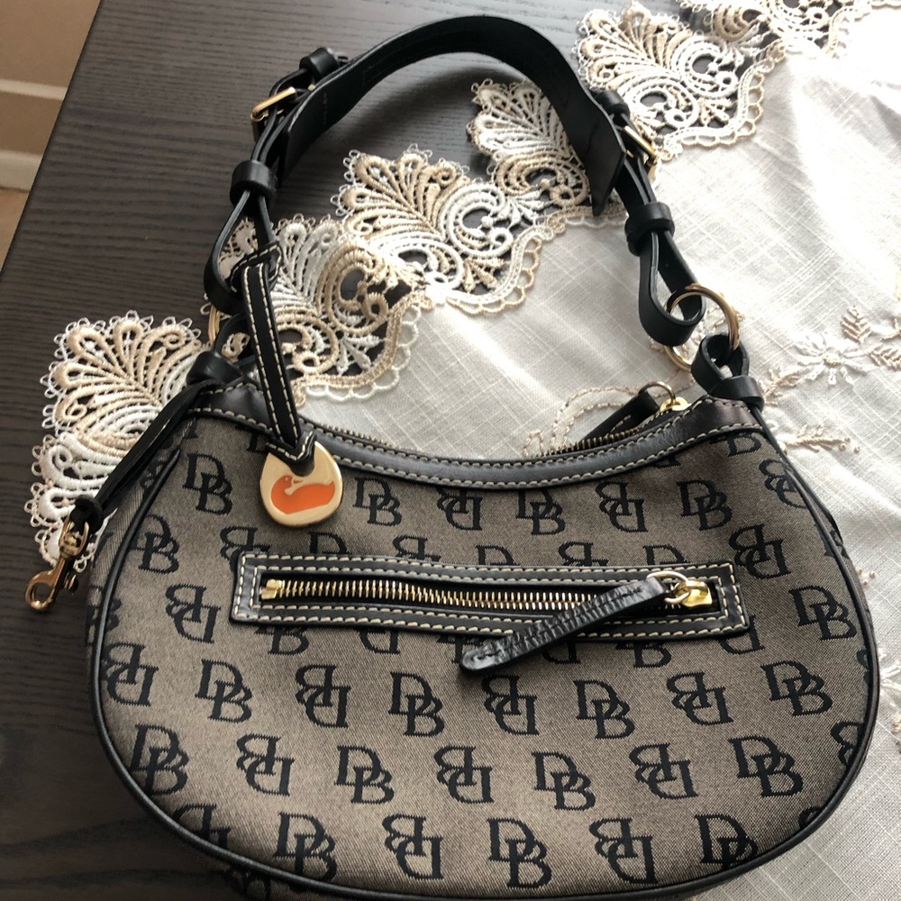 Used twice. DOONEY & BOURKE Black Purse small